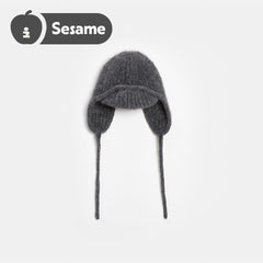 Tagi. Beaded cloth label knitted caps