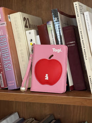 Tagi. Apple passport holder