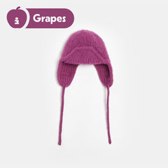 Tagi. Beaded cloth label knitted caps