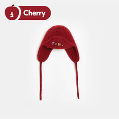 Tagi. Beaded cloth label knitted caps
