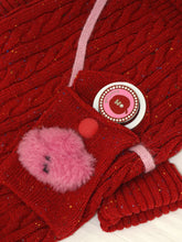 Tagi. Happy new year's pet twist sweater