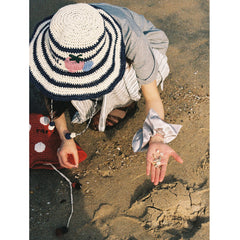 Tagi. Wide-brimmed Woven Hat