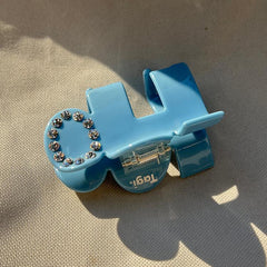 Tagi. mark puzzle texure hair grip