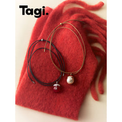 Tagi. Hazelnut Necklace
