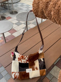 Tagi. Square pattern cross bag