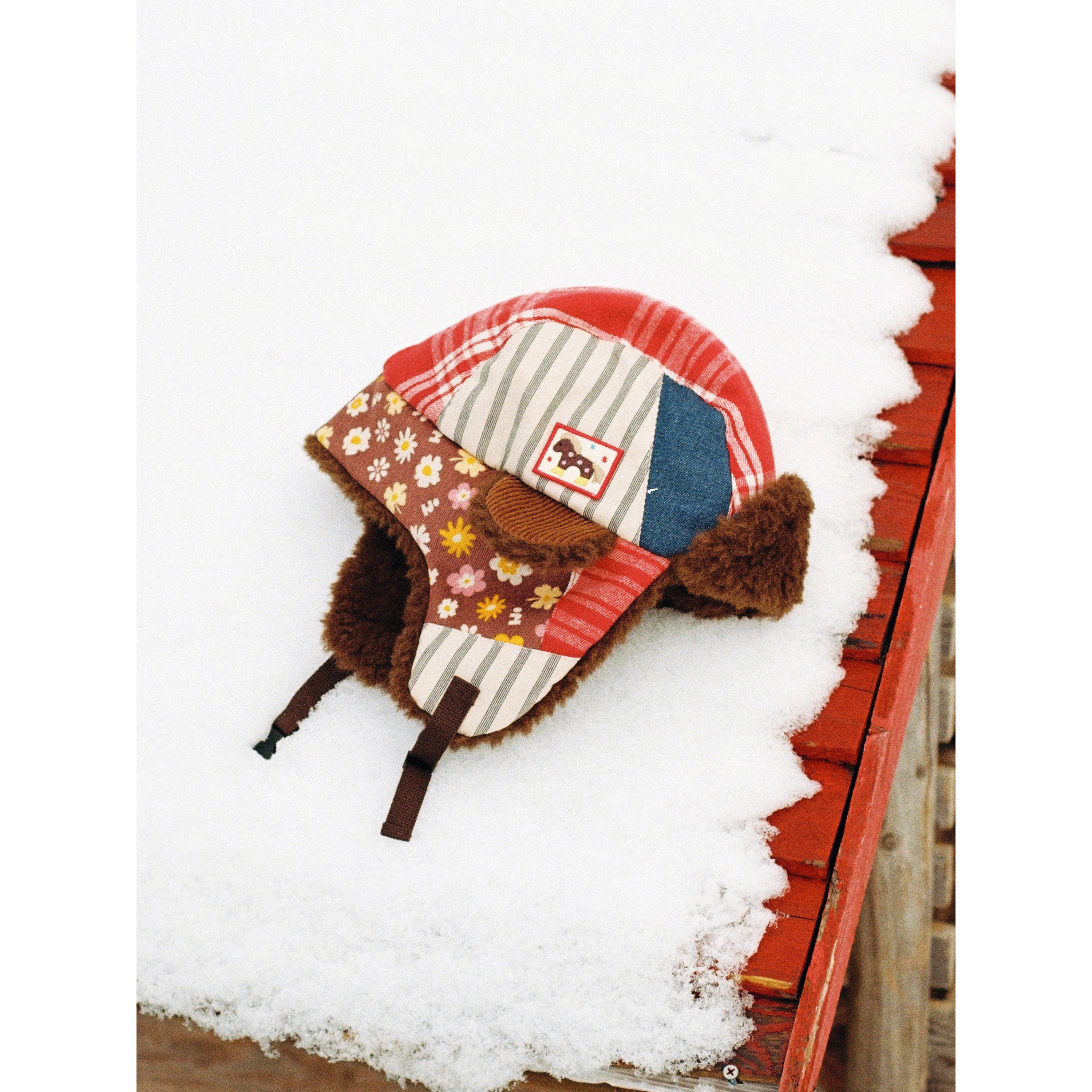 Tagi. Imagine Patchwork Trapper Hat