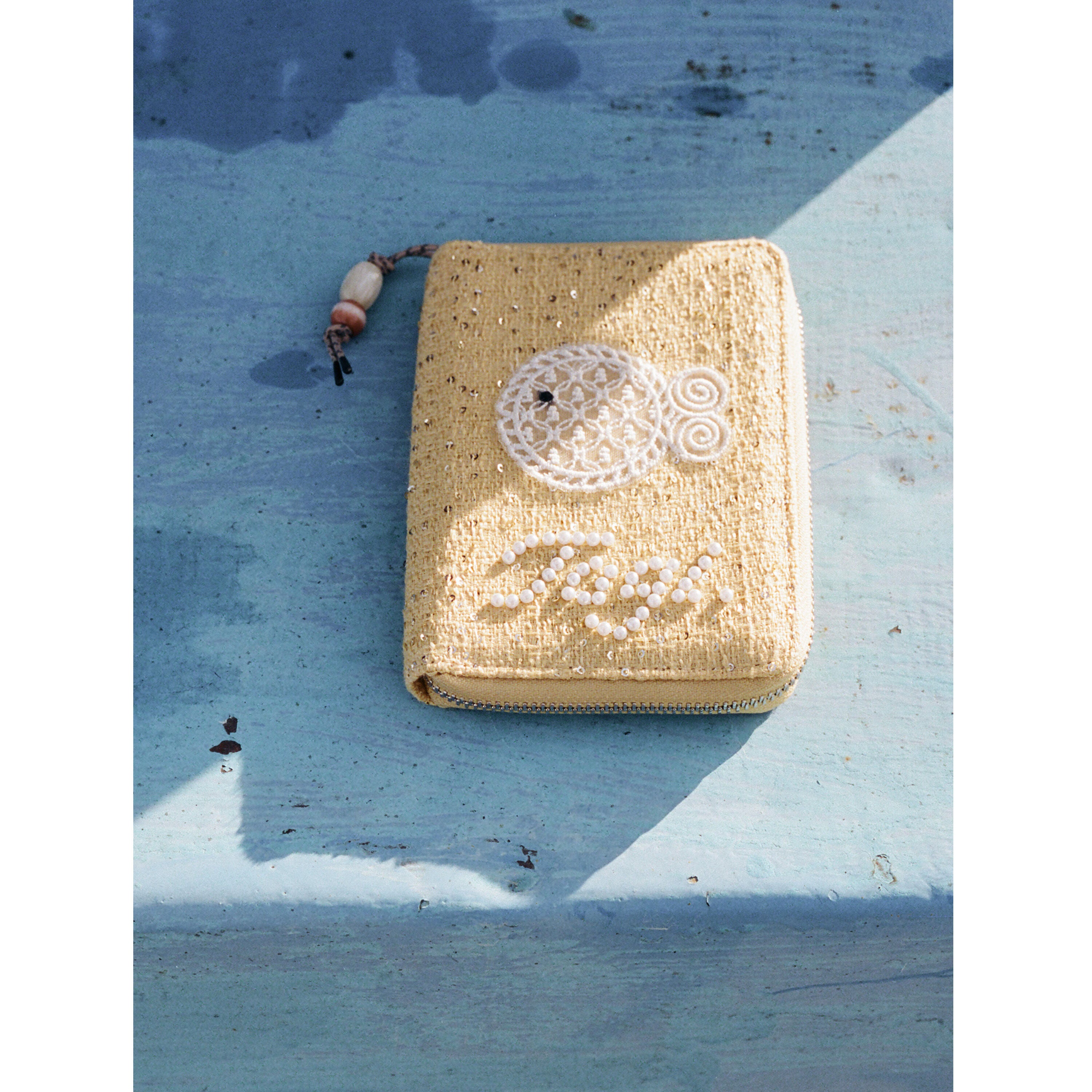 Tagi. Lace Fish Passport Holder