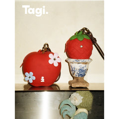 Tagi. Imagine Apple and Inspire Strawberry Silicone Storage Bag Charm