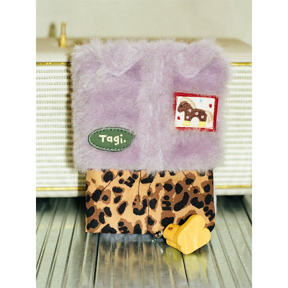 Tagi. Dress-up Game Passport Holder