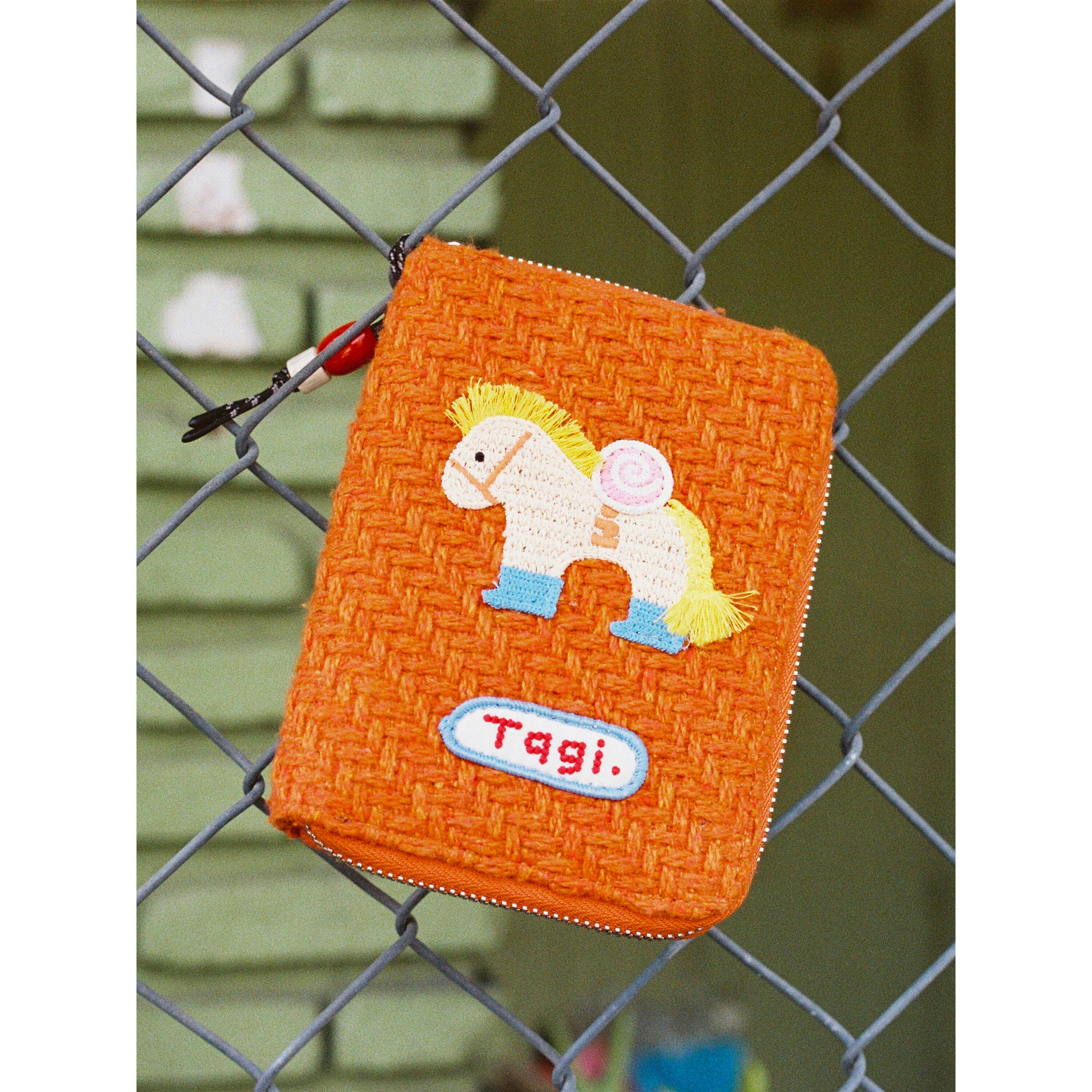 Tagi. Pony Magi Passport Holder