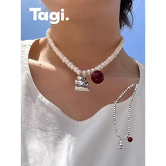 Tagi. Cream Cherry Pearl Necklace